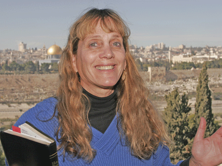 Gila guiding on the Mount of Olives with Jerusalem's Old City in the background