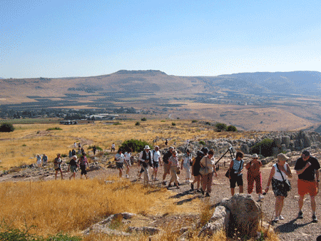 Hiking up to the Arbel lookout point with the Horns of Hattin in the background Hiking up to the Arbel lookout point with the Horns of Hattin in the background