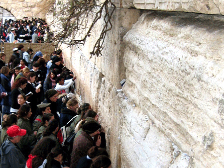 Worshippers at the public prayer area of the Western Wall