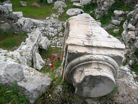 Toppled pillar from an early church commemorating the healing of the lame man Toppled pillar from an early church commemorating the healing of the lame man