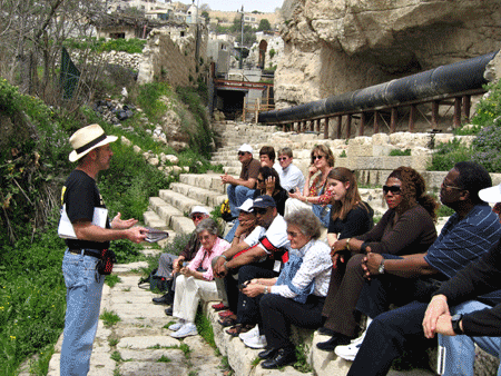 Devotions on the authentic steps leading down to the Pool of Siloam