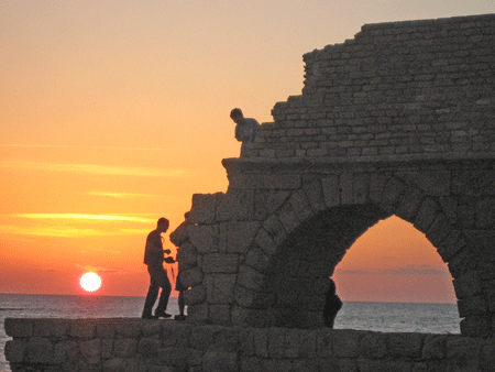 Caesarea's ancient aqueduct at sunset Caesarea's ancient aqueduct at sunset