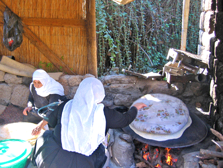 Druze women making pita in the old Flour Mill Druze women making pita in the old Flour Mill
