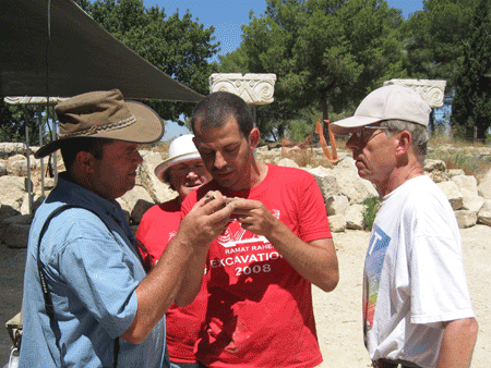 Dr. Oded LIpschits deciphering a stamp impression Dr. Oded LIpschits deciphering a stamp impression