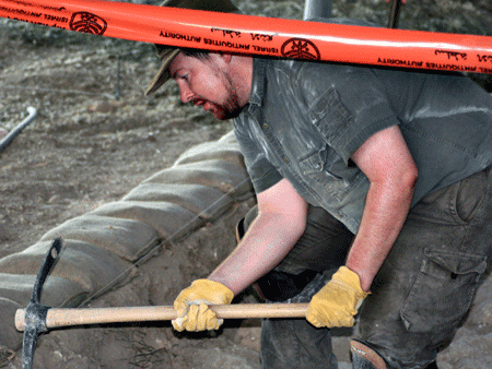 Pick-axing in the locus with the most Iron Age pottery Pick-axing in the locus with the most Iron Age pottery