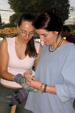 Inspecting a jar handle at Tel Ramat Rahel Inspecting a jar handle at Tel Ramat Rahel