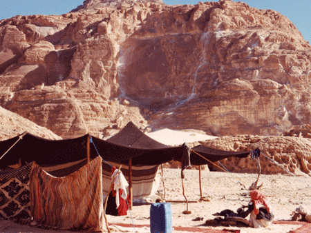 Traditional Beduin tent woven with hairs of the black goat Traditional Beduin tent woven with hairs of the black goat