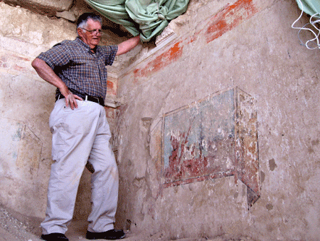 Ehud Netzer revealing colorful wall painting at Herodion's theater Ehud Netzer revealing colorful wall painting at Herodion's theater