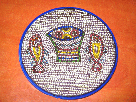 Fish and loaves mosaic copied onto a souvenir plate Fish and loaves mosaic copied onto a souvenir plate