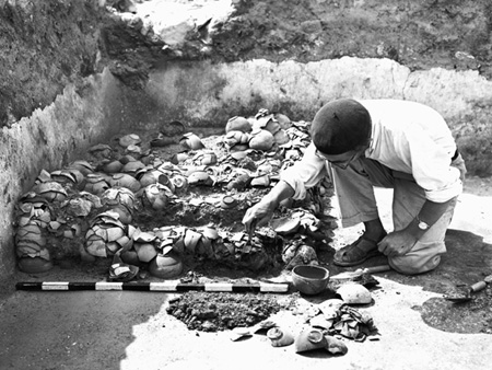 Excavator Roland de Vaux in Qumran's kitchen