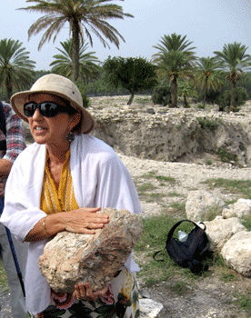 Dr. Norma Franklin holding a mud-brick from the Solomonic period Dr. Norma Franklin holding a mud-brick from the Solomonic period