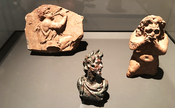 Sculptures of Pan, part human part goat shown with little goat horns