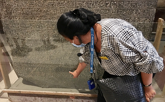 Egyptologist guide pointing out Israel on the Merneptah Stele in Cairo Egyptologist guide pointing out Israel on the Merneptah Stele in Cairo