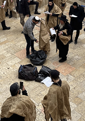Choosing a sackcloth in the courtyard of King David's tomb Choosing a sackcloth in the courtyard of King David's tomb