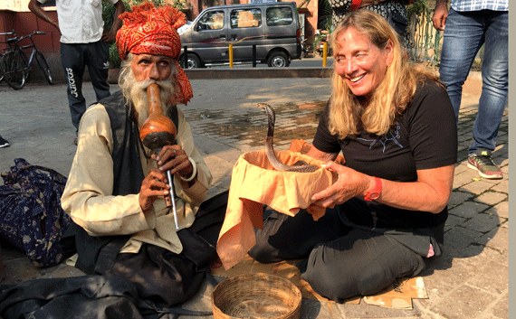 Gila holding a cobra in Delhi India Gila holding a cobra in Delhi India